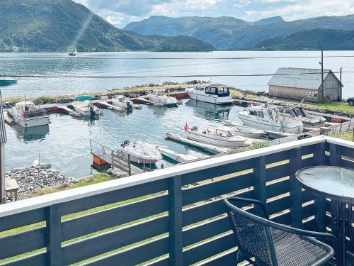 a group of boats in a marina on a lake at 8 person holiday home in Barmen in Barmen
