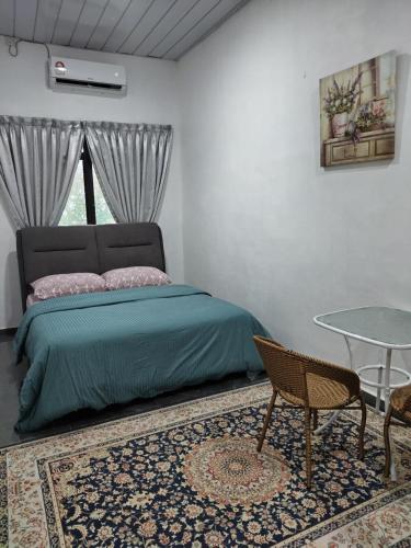 Postel nebo postele na pokoji v ubytování Makwan Homestay B