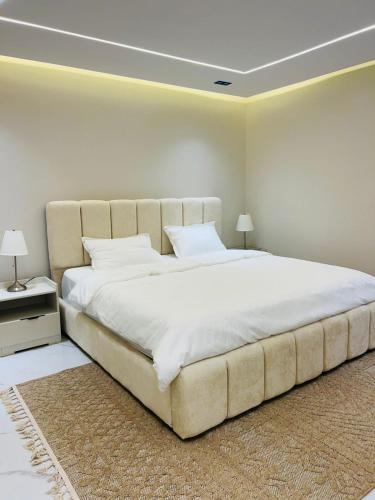 Ένα ή περισσότερα κρεβάτια σε δωμάτιο στο Neem Premium Villa