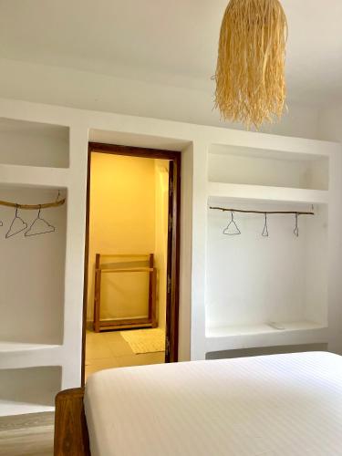 Ένα ή περισσότερα κρεβάτια σε δωμάτιο στο Le petit Relais 1