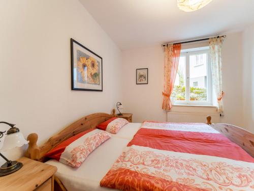 Modern Apartment in Reifferscheid with Gardenにあるベッド