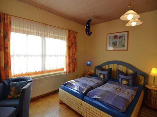 Ένα ή περισσότερα κρεβάτια σε δωμάτιο στο Comfort apartment with balcony in the beautiful Bavarian Forest