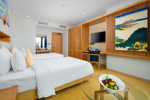 Katil atau katil-katil dalam bilik di Sala Danang Beach Hotel