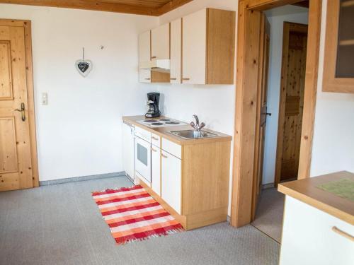 Kuchyň nebo kuchyňský kout v ubytování Rauchenbacher Apartments, Mittersill