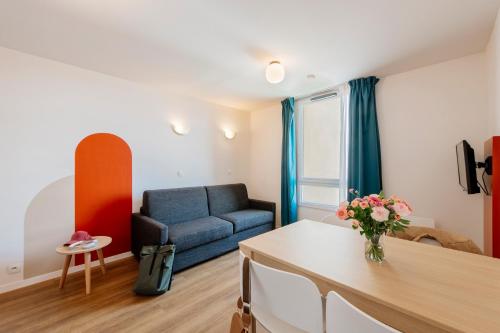 Χώρος καθιστικού στο Aparthotel Adagio Access Paris Saint-Denis Pleyel