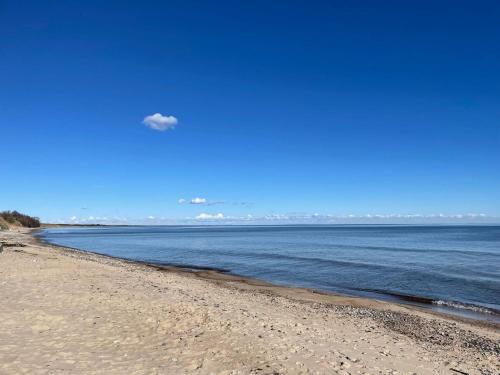 a view of the beach from the shore at 2 person holiday home in Brösarp in Brösarp