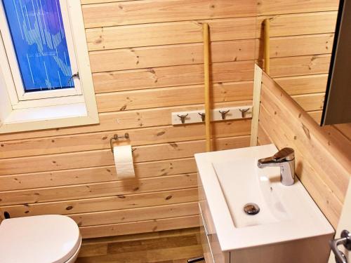 a bathroom with a sink and a toilet at 6 person holiday home in MÅLØY in Måløy