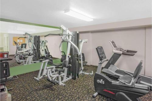 a gym with several tread machines in a room at Townhouse Barstow On Historic Route 66 CA I 15 in Barstow