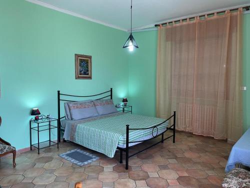 Postel nebo postele na pokoji v ubytování Casa T Bed and Breakfast & Home Restaurant di Tacchino Simone