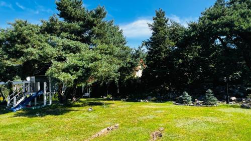 Jardín al aire libre en Dom Wypoczynkowy Simurg