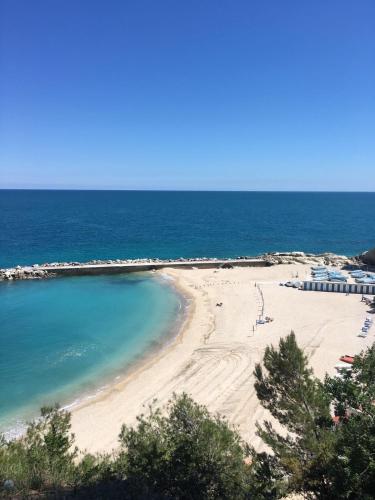 a view of a beach with the ocean at B&B Casa del Fonte in Corinaldo