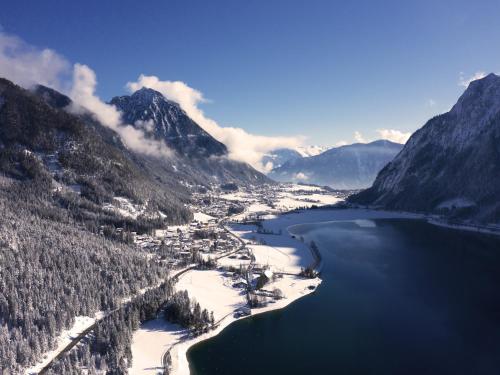 an aerial view of a town next to a lake at Apartment at the Achensee in Achensee