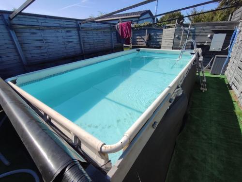 an overhead view of a swimming pool with a hose on top at Na Kocankach - Kocanka 1 