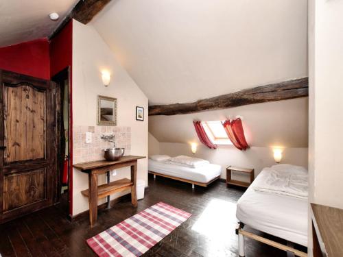 Cama o camas de una habitación en Lierneux Hillside Home