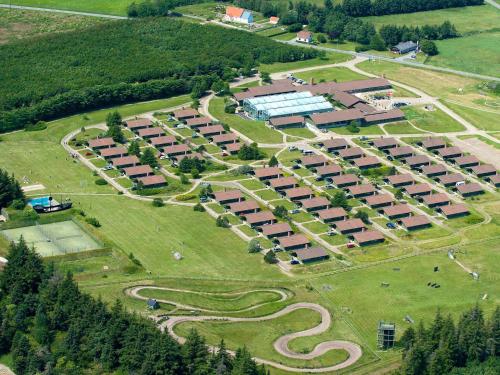 an aerial view of a building complex with trees at Vigsø Holiday Center in Hanstholm