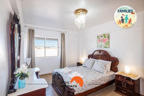 Ένα ή περισσότερα κρεβάτια σε δωμάτιο στο #012 Exclusivo para Famílias, Habijovem by Home Holidays