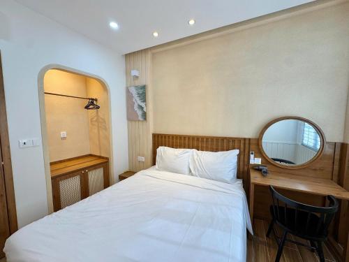Ένα ή περισσότερα κρεβάτια σε δωμάτιο στο Novaworld Phan Thiết - Ni Villa