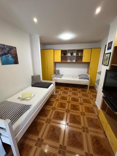 Postel nebo postele na pokoji v ubytování Apartman Moreno, Gajac-Zrće beach-Novalja