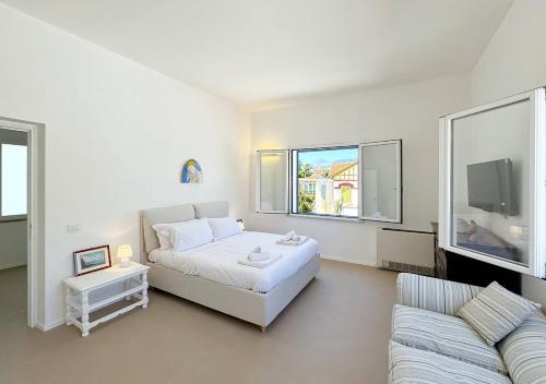 Giường trong phòng chung tại Solemar Sicilia - Villa Regina Elena