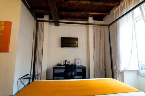 Una cama o camas en una habitación de Argileto Terra