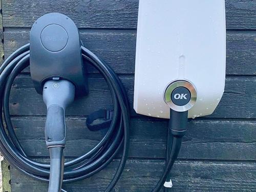 a usb extension cord hooked up to a electrical outlet at 10 person holiday home in Ansager-By Traum in Ansager