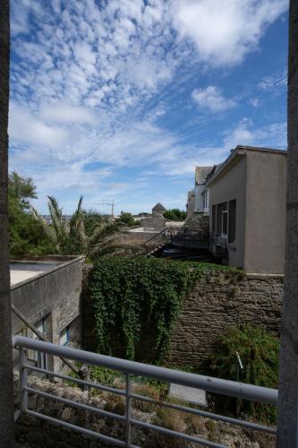 a view from the balcony of a building at Hotel Mercure Roscoff Bord De Mer in Roscoff