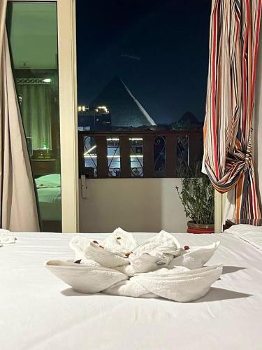 El Aida Pyramids View Boutiqueにあるベッド