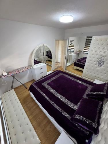 Postel nebo postele na pokoji v ubytování City Center Apartments