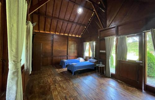 Postel nebo postele na pokoji v ubytování Pavo Resort