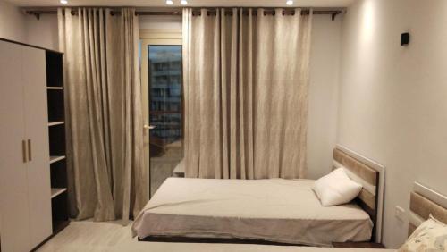 Postel nebo postele na pokoji v ubytování افنيو الهمبرا البرنسيسة ريزورت