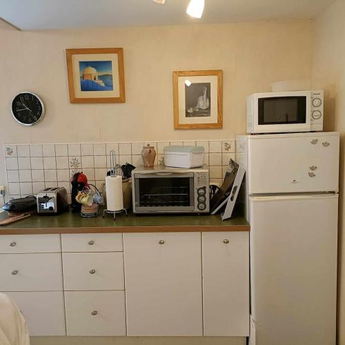 Kuchyň nebo kuchyňský kout v ubytování La parenthèse bucolique Gîte