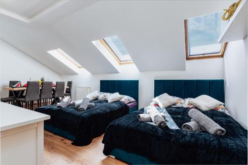 Ένα ή περισσότερα κρεβάτια σε δωμάτιο στο Elephant Luxury Penthouse