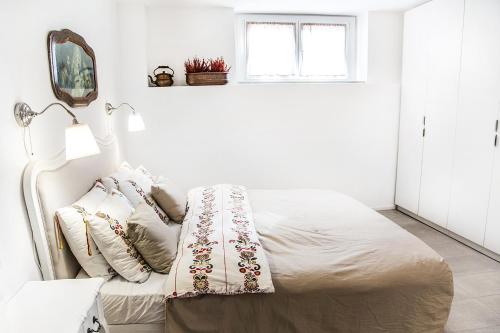 Ένα ή περισσότερα κρεβάτια σε δωμάτιο στο Casa Vacanze con Sauna