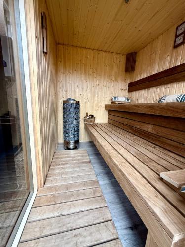 an inside of a sauna with a trash can at Betti in Balatonkeresztúr