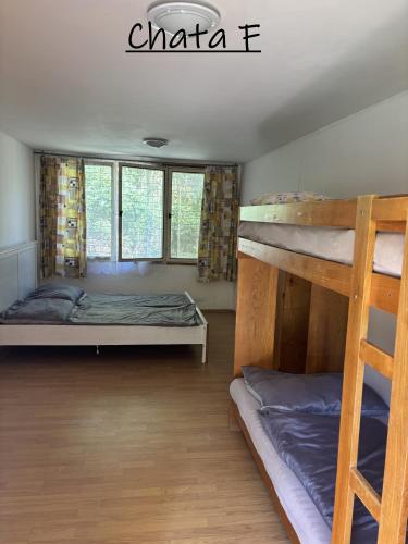 a room with two bunk beds in it at ATC Apollo Lednice in Břeclav