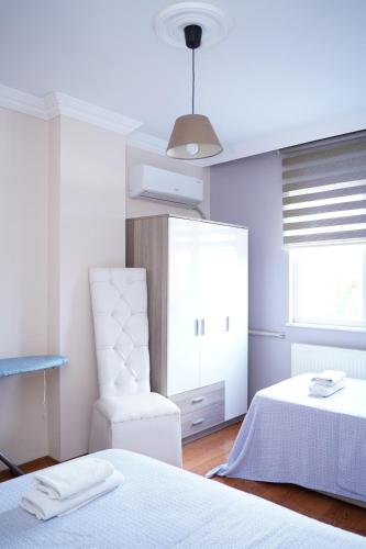 Ένα ή περισσότερα κρεβάτια σε δωμάτιο στο HAS HOME NOZBARt