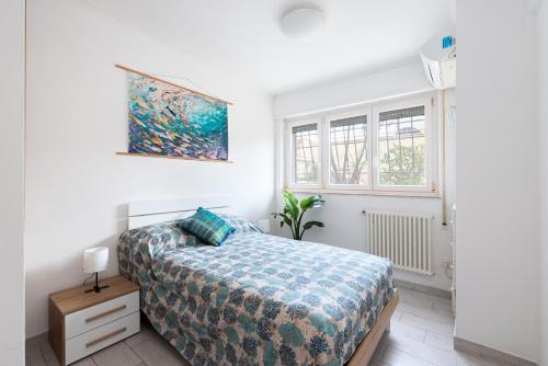 Ένα ή περισσότερα κρεβάτια σε δωμάτιο στο Ostia Beach Apt - 1 Minute Walk