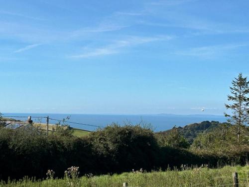 a view of the ocean from a hill at Jack's Shack in Lynton