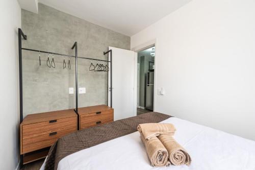 Ένα ή περισσότερα κρεβάτια σε δωμάτιο στο Apto Novo no Centro com Vista - Até 4 Pessoas