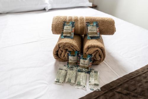 Ένα ή περισσότερα κρεβάτια σε δωμάτιο στο Apto Novo no Centro com Vista - Até 4 Pessoas