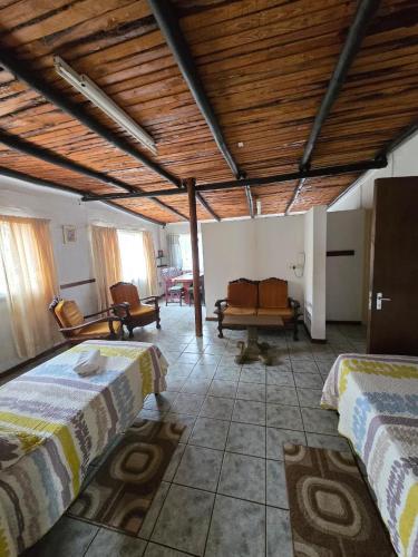 Postel nebo postele na pokoji v ubytování Kanaan Guest Farm