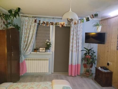 TV a/nebo společenská místnost v ubytování Retro apartament Lukas