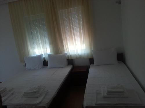 Postel nebo postele na pokoji v ubytování Apartmani Marija