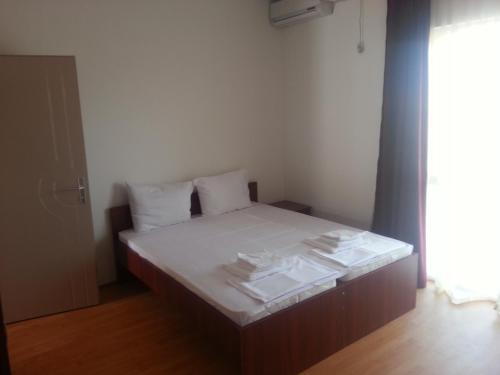 Postel nebo postele na pokoji v ubytování Apartmani Marija