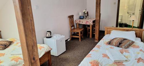 Cama o camas de una habitación en Karczma na Woli