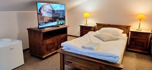Cama o camas de una habitación en Karczma na Woli
