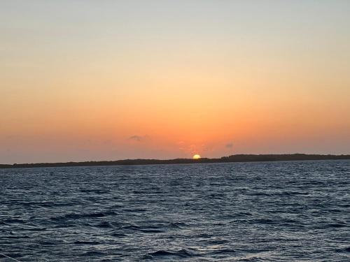a sunset over a large body of water at Unit was sold in Caraballeda