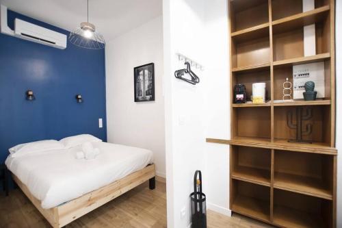 Llit o llits en una habitació de Superbe studio proche tour Eiffel