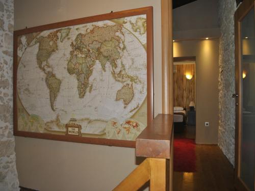 a large map of the world hanging on a wall at Villa in Giannoudi with Pool and Beach Nearby in Giannoudi