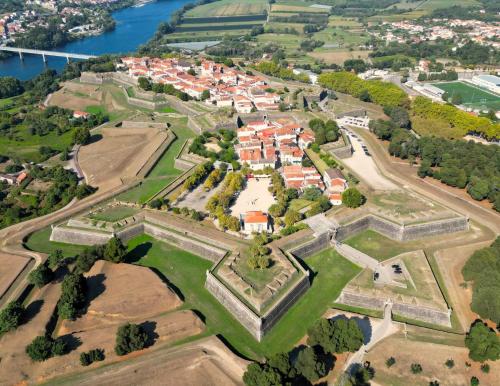 an aerial view of a park with a castle at Valença RoofTop by Beeflats BnB in Valença